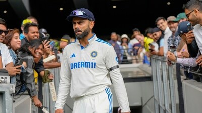 India's Virat Kohli walks out before the start of play on the second day of Boxing Day Test match at the MCG. (AP) India's Virat Kohli walks out before the start of play on the second day of Boxing Day Test match at the MCG. (AP)