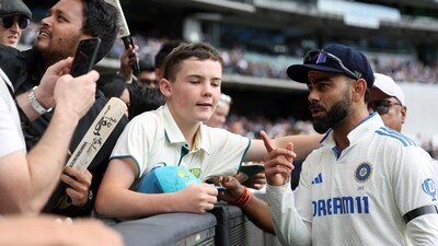 India's Virat Kohli poses for selfies on day two of the fourth cricket Test match (AFP) India's Virat Kohli poses for selfies on day two of the fourth cricket Test match (AFP)