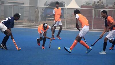Players in action during the hockey match at PAU in Ludhiana on Friday. (HT Photo) Players in action during the hockey match at PAU in Ludhiana on Friday. (HT Photo)