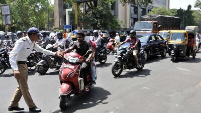To enhance road safety, the Pune Traffic Branch has undertaken stringent measures, including prosecuting 1,396 individuals for riding triple seats, 642 for driving on the wrong side, and 12,444 for jumping signals. (HT PHOTO) To enhance road safety, the Pune Traffic Branch has undertaken stringent measures, including prosecuting 1,396 individuals for riding triple seats, 642 for driving on the wrong side, and 12,444 for jumping signals. (HT PHOTO)