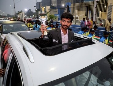 World Chess Champion D Gukesh shows the World Chess Championship 2024 trophy during a felicitation ceremony, in Chennai. (Lakshmi ) World Chess Champion D Gukesh shows the World Chess Championship 2024 trophy during a felicitation ceremony, in Chennai. (Lakshmi )