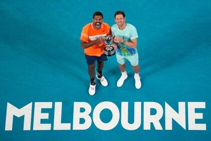 Rohan Bopanna, left, of India and Matthew Ebden of Australia pose with their trophy after defeating Simone Bolelli and Andrea Vavassori of Italy in the men's doubles final. (AP) Rohan Bopanna, left, of India and Matthew Ebden of Australia pose with their trophy after defeating Simone Bolelli and Andrea Vavassori of Italy in the men's doubles final. (AP)