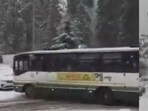 The HRTC bus lost control on icy roads, hitting a parked vehicle. The HRTC bus lost control on icy roads, hitting a parked vehicle.