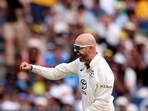 Australia's Nathan Lyon celebrates the wicket of India's Washington Sundar on day three of the fourth Test against Australia.