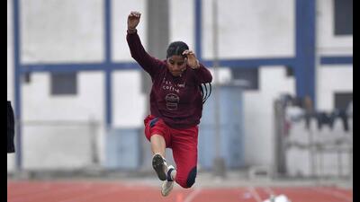 Athletes in action at Guru Nanak Stadium in Ludhiana on Saturday. (Manish/HT) Athletes in action at Guru Nanak Stadium in Ludhiana on Saturday. (Manish/HT)