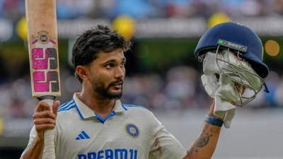 India's Nitish Kumar Reddy acknowledges the crowd as he walks off the field. (AP) India's Nitish Kumar Reddy acknowledges the crowd as he walks off the field. (AP)