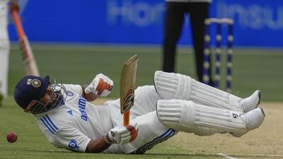 India’s Rishabh Pant reacts after being hit by a ball on Day 3 of the fourth Test against Australia at the Melbourne Cricket Ground on Saturday (AP) India’s Rishabh Pant reacts after being hit by a ball on Day 3 of the fourth Test against Australia at the Melbourne Cricket Ground on Saturday (AP)