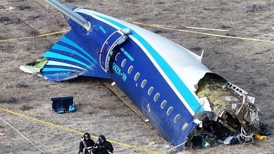 A drone view shows emergency specialists working at the crash site of an Azerbaijan Airlines passenger plane near the city of Aktau, Kazakhstan (REUTERS)