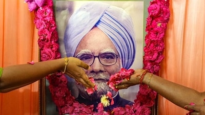 People pay tributes to former prime minister Manmohan Singh in Chennai on Friday. (PTI) People pay tributes to former prime minister Manmohan Singh in Chennai on Friday. (PTI)