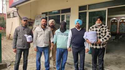 The accused in police custody in Ludhiana on Saturday. (HT photo) The accused in police custody in Ludhiana on Saturday. (HT photo)