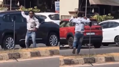 In a viral video, a man filmed a reel on a busy road. (X/@gharkekalesh) In a viral video, a man filmed a reel on a busy road. (X/@gharkekalesh)