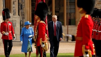 US president Donald Trump and Britain's Queen Elizabeth inspect the Coldstream Guards during a visit to Windsor Castle in Windsor, Britain, on July 13, 2018. (Reuters) US president Donald Trump and Britain's Queen Elizabeth inspect the Coldstream Guards during a visit to Windsor Castle in Windsor, Britain, on July 13, 2018. (Reuters)
