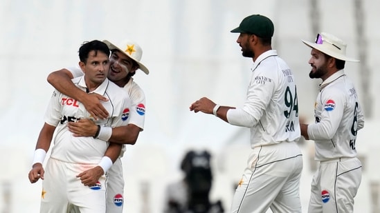 Pakistan's Mohammad Abbas, left, celebrates with teammates after successfully appealing for LBW against South Africa's Tristan Stubbs. (AP/PTI Photo)(AP12_28_2024_000417B)