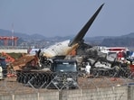 Firefighters and rescue personnel work near the wreckage of a Jeju Air Boeing 737-800 series aircraft after the plane crashed and burst into flames at Muan International Airport in South Jeolla Province, some 288 kilometres southwest of Seoul on December 29, 2024. Firefighters and rescue personnel work near the wreckage of a Jeju Air Boeing 737-800 series aircraft after the plane crashed and burst into flames at Muan International Airport in South Jeolla Province, some 288 kilometres southwest of Seoul on December 29, 2024.