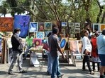 Visitors walking through exhibitions at the annual Chitra Santhe art fair in Bangalore. (Old pic) Visitors walking through exhibitions at the annual Chitra Santhe art fair in Bangalore. (Old pic)