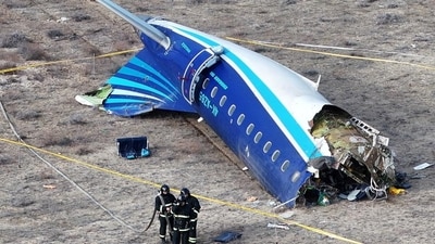 Emergency specialists working at the crash site of the plane crash (HT_PRINT) Emergency specialists working at the crash site of the plane crash (HT_PRINT)