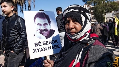 A protester holds up a placard bearing a portrait of Abdullah Ocalan, the leader of the Kurdistan Worker's Party (PKK) -- jailed in Turkey since 1999 (AFP) A protester holds up a placard bearing a portrait of Abdullah Ocalan, the leader of the Kurdistan Worker's Party (PKK) -- jailed in Turkey since 1999 (AFP)