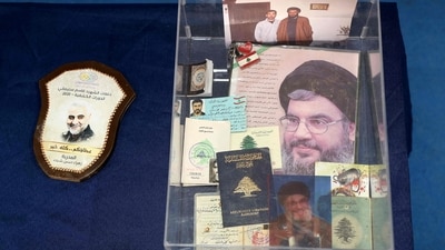 FILE PHOTO: Documents, letters and photographs the Israeli army says belonged to the Lebanese militant group Hezbollah, and were seized by the army during its ground operation in south Lebanon, are displayed to the media on December 23, 2024, in a northern Israeli military base. (AFP) FILE PHOTO: Documents, letters and photographs the Israeli army says belonged to the Lebanese militant group Hezbollah, and were seized by the army during its ground operation in south Lebanon, are displayed to the media on December 23, 2024, in a northern Israeli military base. (AFP)