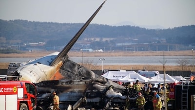 Firefighters carry out rescue operations on an aircraft which drove off the runway at Muan International Airport in Muan, South Jeolla Province, South Korea, December 29, 2024. (Reuters)