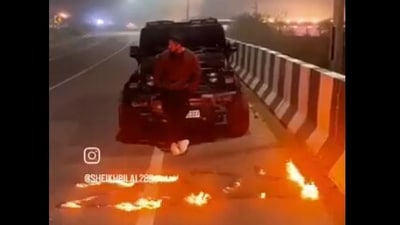 Man in UP's Fatehpur set road on fire for Instagram reel, writing "2024" with petrol. (X/@DSatyavrata) Man in UP's Fatehpur set road on fire for Instagram reel, writing "2024" with petrol. (X/@DSatyavrata)