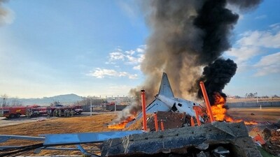 Firefighters carry out extinguishing operations on an aircraft which drove off runaway at Muan International Airport in Muan, South Jeolla Province, South Korea, December 29, 2024. (Reuters)