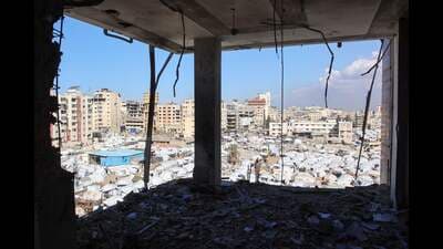 This picture shows tents housing displaced Palestinians in the central Gaza Strip on December 29, 2024, amid the ongoing war between Israel and the Palestinian Hamas movement. (Photo by Omar AL-QATTAA / AFP) (AFP) This picture shows tents housing displaced Palestinians in the central Gaza Strip on December 29, 2024, amid the ongoing war between Israel and the Palestinian Hamas movement. (Photo by Omar AL-QATTAA / AFP) (AFP)