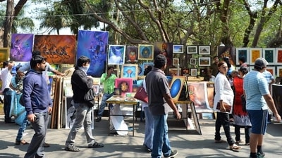 Visitors walking through exhibitions at the annual Chitra Santhe art fair in Bangalore. (Old pic) (AFP) Visitors walking through exhibitions at the annual Chitra Santhe art fair in Bangalore. (Old pic) (AFP)