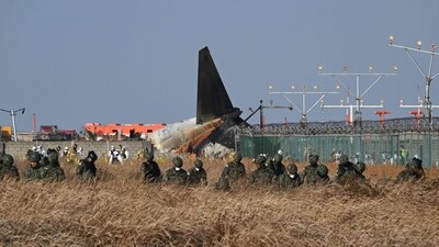 South Korean soldiers search for missing passengers near the wreckage of a Jeju Air Boeing 737-800 series aircraft after the plane crashed and burst into flames at Muan International Airport in South Jeolla Province, some 288 kilometres southwest of Seoul on December 29, 2024. (AFP) South Korean soldiers search for missing passengers near the wreckage of a Jeju Air Boeing 737-800 series aircraft after the plane crashed and burst into flames at Muan International Airport in South Jeolla Province, some 288 kilometres southwest of Seoul on December 29, 2024. (AFP)