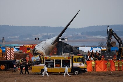 The wreckage of Jeju Air Flight 2216 at Muan International Airport. (Bloomberg) The wreckage of Jeju Air Flight 2216 at Muan International Airport. (Bloomberg)