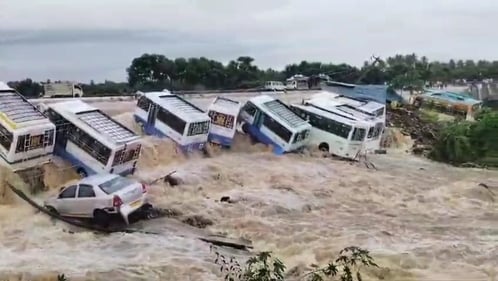 **EDS: BEST QUALITY AVAILABLE** Krishnagiri: Swept away vehichles in flooded Uthangarai area following heavy rainfall in the aftermath of Cyclone Fengal, in Krishnagiri district, Tamil Nadu, Monday, Dec. 2, 2024. (PTI Photo) (PTI12_02_2024_000166B) (PTI) **EDS: BEST QUALITY AVAILABLE** Krishnagiri: Swept away vehichles in flooded Uthangarai area following heavy rainfall in the aftermath of Cyclone Fengal, in Krishnagiri district, Tamil Nadu, Monday, Dec. 2, 2024. (PTI Photo) (PTI12_02_2024_000166B) (PTI)