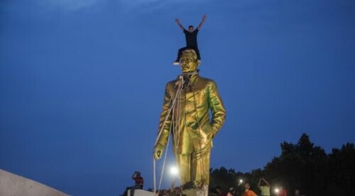 Protesters atop the statue of Sheikh Mujibur Rahman in Dhaka Protesters atop the statue of Sheikh Mujibur Rahman in Dhaka