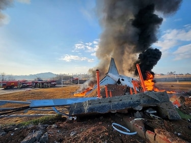In this photo provided by South Korea's Muan Fire Station, a passenger plane is in flames at the Muan International Airport in Muan, South Korea, Sunday, Dec. 29, 2024. (South Korea's Muan Fire Station via AP) (AP) In this photo provided by South Korea's Muan Fire Station, a passenger plane is in flames at the Muan International Airport in Muan, South Korea, Sunday, Dec. 29, 2024. (South Korea's Muan Fire Station via AP) (AP)