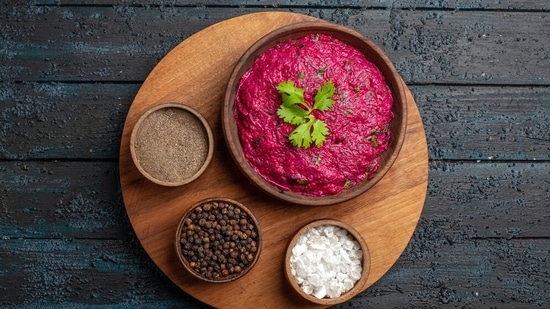 Method: In a bowl, add beetroot and yoghurt and mix well. Add the black pepper, chaat masala, and fresh coriander. Now for the tadka, to the oil, add jeera, mustard seeds, curry leaves, asafoetida. Mix the tadka with the beetroot and yoghurt and serve. (Representative photo: Freepik)