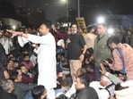 Jan Suraj Party founder Prashant Kishore addressing BPSC candidates during blocking road at JP roundabout in Patna.   (Santosh Kumar/ Hindustan Times)