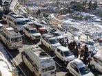Vehicles stuck in a traffic jam near Nehru Kund on the way to Solang Valley, in Manali on Sunday. Vehicles stuck in a traffic jam near Nehru Kund on the way to Solang Valley, in Manali on Sunday.