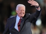 Jimmy Carter death: Flags at half-staff to gun salutes, what we can expect after former president's passing (Photo by Robyn BECK / AFP) Jimmy Carter death: Flags at half-staff to gun salutes, what we can expect after former president's passing (Photo by Robyn BECK / AFP)