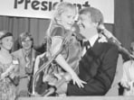 Georgia Gov. Jimmy Carter holds his daughter, Amy, just after he made his official announcement that he would seek the Democratic nomination for presidency on Dec. 13, 1974, in Atlanta. (AP Photo, File)