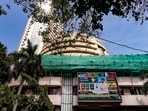 A screen displays stock numbers outside the Bombay Stock Exchange (BSE) building in Mumbai. A screen displays stock numbers outside the Bombay Stock Exchange (BSE) building in Mumbai.