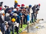 Former prime minister Manmohan Singh's ashes being immersed at the Asth Ghat, Majnu Ka Tilla in New Delhi.