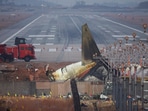 The wreckage of the Jeju Air aircraft that went off the runway and crashed lies at Muan International Airport, in Muan, South Korea, The wreckage of the Jeju Air aircraft that went off the runway and crashed lies at Muan International Airport, in Muan, South Korea,