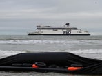 The French navy deployed a helicopter to help rescue the migrants.