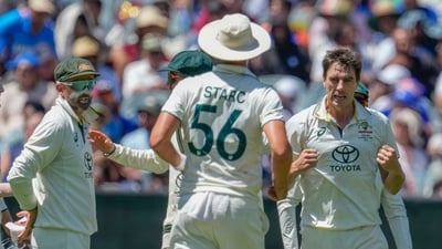 Australia's captain Pat Cummins, right, celebrates with teammates after the dismissal of India's KL Rahul during play on the last day of the fourth cricket test between Australia and India. (AP/PTI)(AP12_30_2024_000026B) (AP) Australia's captain Pat Cummins, right, celebrates with teammates after the dismissal of India's KL Rahul during play on the last day of the fourth cricket test between Australia and India. (AP/PTI)(AP12_30_2024_000026B) (AP)
