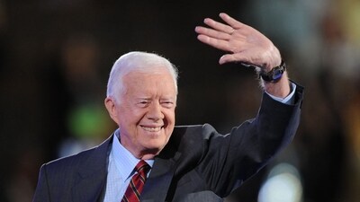 Jimmy Carter death: Flags at half-staff to gun salutes, what we can expect after former president's passing (Photo by Robyn BECK / AFP) (AFP) Jimmy Carter death: Flags at half-staff to gun salutes, what we can expect after former president's passing (Photo by Robyn BECK / AFP) (AFP)