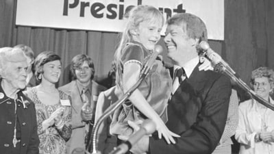 Georgia Gov. Jimmy Carter holds his daughter, Amy, just after he made his official announcement that he would seek the Democratic nomination for presidency on Dec. 13, 1974, in Atlanta. (AP Photo, File) (AP) Georgia Gov. Jimmy Carter holds his daughter, Amy, just after he made his official announcement that he would seek the Democratic nomination for presidency on Dec. 13, 1974, in Atlanta. (AP Photo, File) (AP)