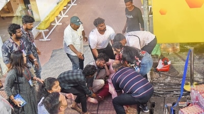 Rescue workers help MLA Uma Thomas who got injured as she fell from the gallery of the Jawaharlal Nehru Stadium, in Kochi on Sunday, (PTI) Rescue workers help MLA Uma Thomas who got injured as she fell from the gallery of the Jawaharlal Nehru Stadium, in Kochi on Sunday, (PTI)