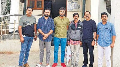 The three accused (2nd, 3rd, and 4th from left) carried out the entire operation via WhatsApp video calls alone. The three accused (2nd, 3rd, and 4th from left) carried out the entire operation via WhatsApp video calls alone.
