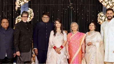 Amitabh Bachchan, Jaya Bachchan and Abhishek Bachchan at the wedding reception. Amitabh Bachchan, Jaya Bachchan and Abhishek Bachchan at the wedding reception.