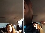 The image shows an altercation between a woman and a cab driver. 