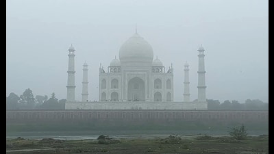A thin layer of fog covers the Taj Mahal as temperature dips, in Agra on Monday. (ANI) A thin layer of fog covers the Taj Mahal as temperature dips, in Agra on Monday. (ANI)