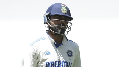 India's Virat Kohli leaves the field after being dismissed on day five of the fourth cricket Test match between Australia and India at the Melbourne Cricket Ground (AFP)